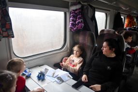 Passengers in a retro train car