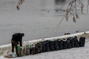 Garbage collection on the banks of the river Uzh