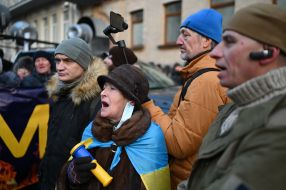 Petro Poroshenko's supporters are marching down the street