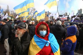 Petro Poroshenko's supporters are marching down the street