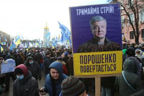Petro Poroshenko's supporters are marching down the street