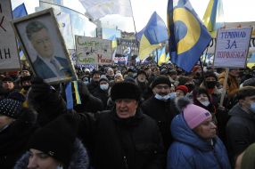 Petro Poroshenko's supporters are marching down the street
