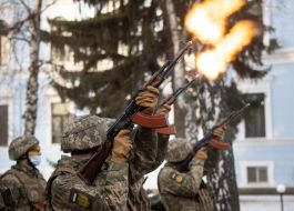 The salute group fires from small arms