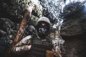 Ukrainian serviceman in the trenches
