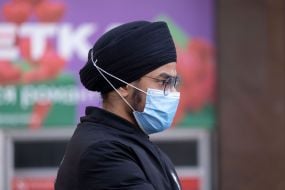 A man in a protective mask