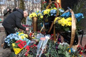 Laying flowers at the memorial to soldiers killed in Afghanistan