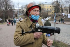 Мужчина с фотоаппаратом