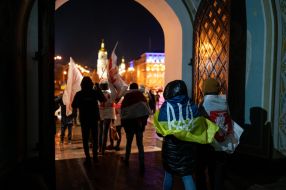 People leave the territory of St. Michael's Cathedral