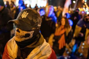 Young man wearing a skull mask