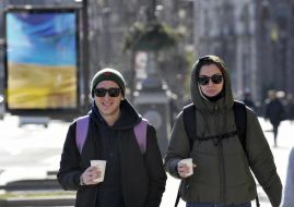 People with coffee on the street
