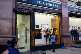 The girls walk holding hands