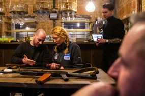 Representatives of the terrorist defense with Kalashnikov rifles in one of the cafes in Zhytomyr