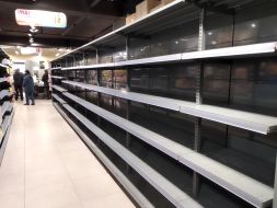 Empty shelves in a supermarket in Kiev