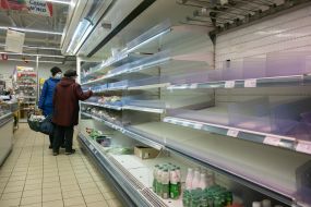 Empty shelves in a supermarket in Kiev
