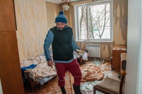 A man in a house in Kharkiv destroyed after the shelling by the Russian military occupiers