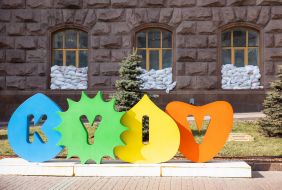 The windows of the first floor of the Kyiv City State Administration are barricaded with sandbags