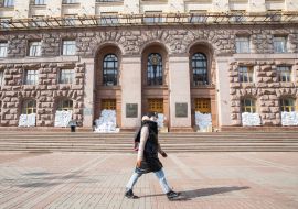 The windows of the first floor of the Kyiv City State Administration are barricaded with sandbags