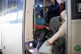 People in the evacuation train at the train station