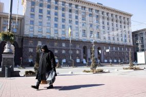 Elderly woman with packages on Khreshchatyk