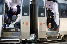 People in the evacuation train at the train station