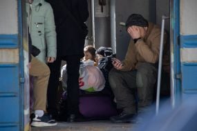 People in the evacuation train at the train station