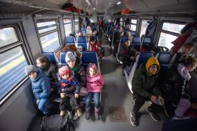 People in the evacuation train at the train station