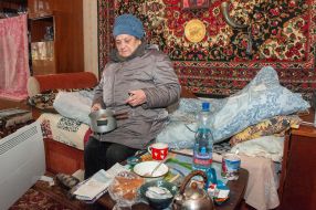A woman in an apartment in Kharkiv