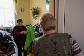 Clothes for migrants are laid out in the classroom of one of the schools in Drohobych