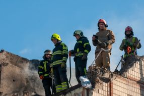 Rescuers dismantle the rubble of a residential building in Kharkiv destroyed after the shelling by the Russian military occupiers