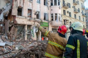 Rescuers dismantle the rubble of a residential building in Kharkiv destroyed after the shelling by the Russian military occupiers