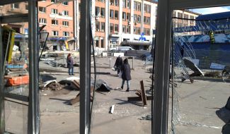 Frames without glass in a shop destroyed by an explosion wave in Kyiv