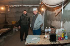 Men in the basement of one of the apartment buildings in Kharkiv