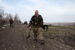 The Ukrainian soldier walks along the territories temporarily occupied by the Russian army