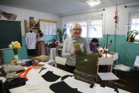 Volunteers sew covers for body armor in a sewing shop in the city of Stryi