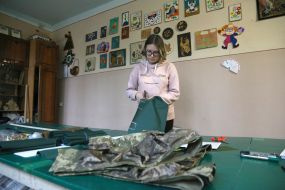 Volunteers sew covers for body armor in a sewing shop in the city of Stryi