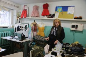 Volunteers sew covers for body armor in a sewing shop in the city of Stryi