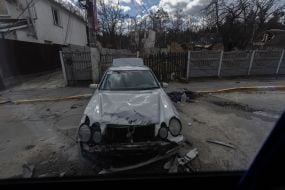 A car destroyed in Bucha as a result of shelling