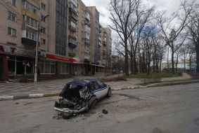 A car destroyed in Bucha as a result of shelling