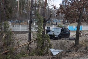 A car destroyed in Bucha as a result of shelling