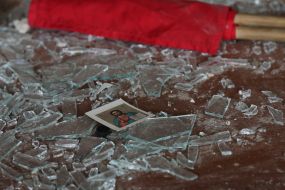 A small icon among the fragments of glass