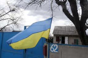 Ukrainian flag on the fence