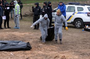 Exhumation of bodies from the mass grave in Bucha