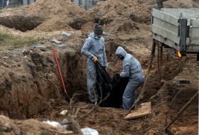 Exhumation of bodies from the mass grave in Bucha