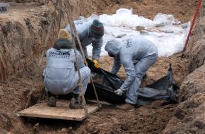 Exhumation of bodies from the mass grave in Bucha