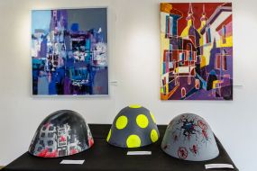 Painted steel helmets during the presentation of the art project "Antidote" in Uzhgorod