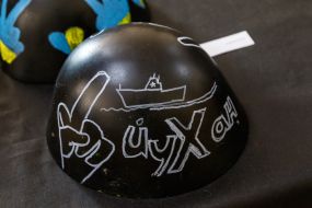 Painted steel helmets during the presentation of the art project "Antidote" in Uzhgorod