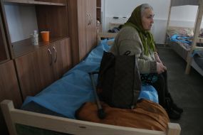 An elderly woman in a refugee center in Lviv