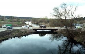 Temporary wooden bridge over the river Irpin in the village of Stoyanka