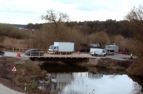 Temporary wooden bridge over the river Irpin in the village of Stoyanka