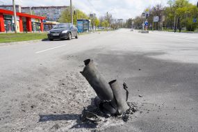 A shell stuck in the asphalt in Kharkiv